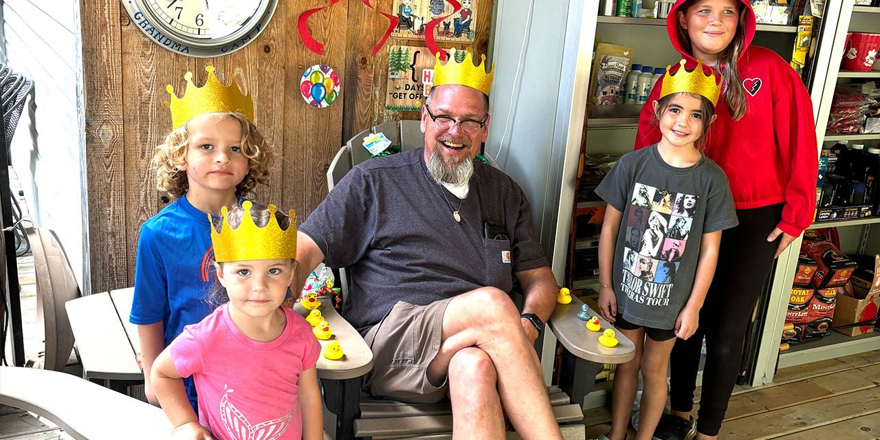 Family enjoying a summer activity together at Gateway Park Campground in Hillsdale Michigan