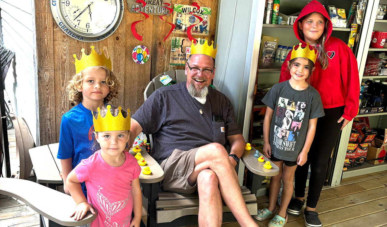 Family enjoying a summer activity together at Gateway Park Campground in Hillsdale Michigan